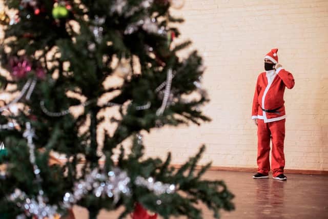 The new strains of the virus have changed many people's Christmas plans this year (Photo: LUCA SOLA/AFP via Getty Images)