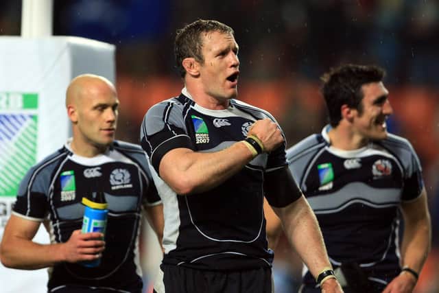 Jason White, Scotland captain at the 2007 Rugby World Cup, celebrates the win over Italy at Stade Geoffroy Guichard in Saint-Etienne which secured the team's place in the quarter-finals.  (Photo by Richard Heathcote/Getty Images)