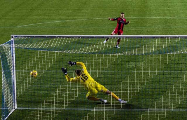 Kyle McAllister scores the winning penalty for St Mirren in their dramatic shoot-out victory over Kilmarnock at Rugby Park in the Scottish Cup quarter-final on Monday. (Photo by Craig Williamson / SNS Group)