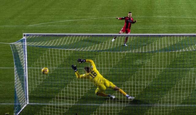 Kyle McAllister scores the winning penalty for St Mirren in their dramatic shoot-out victory over Kilmarnock at Rugby Park in the Scottish Cup quarter-final on Monday. (Photo by Craig Williamson / SNS Group)