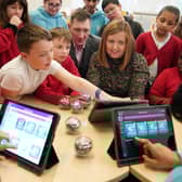 CGI’s Lyndsey Teaz and Andrew Fournet with the Technicoders at Corstorphine Primary. Image: Stewart Attwood Photography 2023.