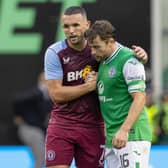 Aston Villa's John McGinn consoles his former Hibs team-mate Lewis Stevenson at full time. (Photo by Ross Parker / SNS Group)