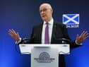 First Minister John Swinney during his speech on national renewal and prevention, at the Imaging Centre of Excellence (ICE) at Queen Elizabeth University Hospital, Glasgow. Photo: Robert Perry/PA Wire