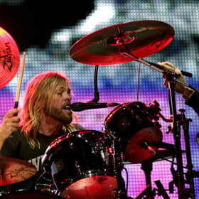 Taylor Hawkins of the Foo Fighters performing live at the V Festival at Hylands Park in Chelmsford, Essex.
