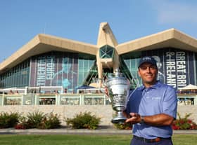 Winning Continental Europe captain Francesco Molinari shows off the trophy at Abu Dhabi Golf Club. Picture: Andrew Redington/Getty Images.