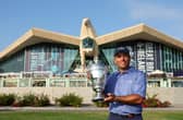 Winning Continental Europe captain Francesco Molinari shows off the trophy at Abu Dhabi Golf Club. Picture: Andrew Redington/Getty Images.