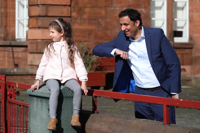 Anas Sarwar meets six-year-old Antonia Madden while visiting Bellshill Academy in Glasgow during the election campaign (Picture: Andrew Milligan/PA)