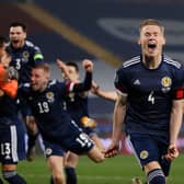 Scott McTominay celebrates at full-time against Serbia.