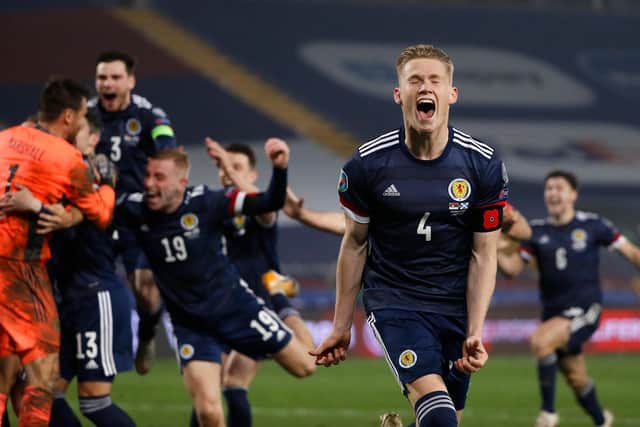 Scott McTominay celebrates at full-time against Serbia.