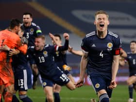 Scott McTominay celebrates at full-time against Serbia.