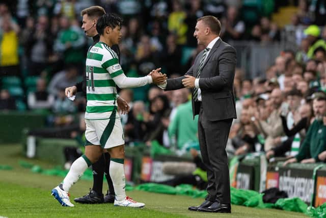 Celtic's Reo Hatate gets a handshake from Brendan Rodgers following his late substitution in the 4-0 win over Kilmarnock. (Photo by Craig Williamson / SNS Group)