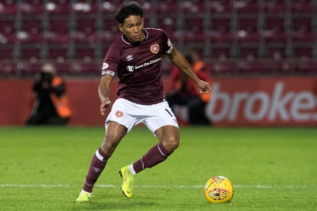 Mitchell had spells with Hibs' city rivals Hearts when on loan from Manchester United.