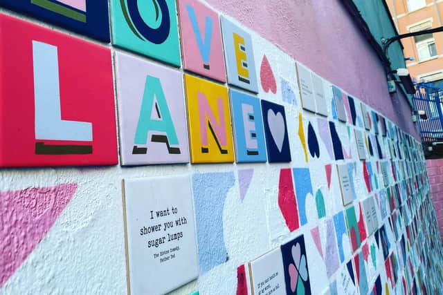 Love Lane, a laneway in the Temple Bar area of Dublin dedicated to love with romantic quotes printed on tiles along the wall. Pic: PA Photo/Rebecca Black.