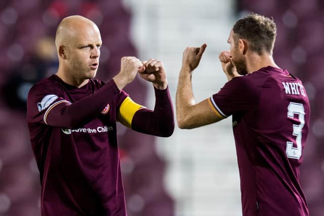 Hearts captain Steven Naismith with defender Aidy White.
