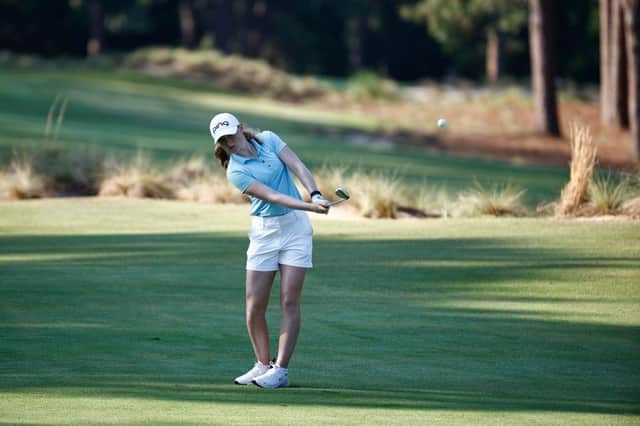 Louise Duncan of Scotland plays a shot on the tenth hole during the first round of the 77th US Women's Open Championship at Pine Needles Lodge and Golf Club on June 02, 2022 in Southern Pines, North Carolina. (Photo by Jared C. Tilton/Getty Images)