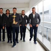 Shane Lowry, Bernd Wiesberger, Tommy Fleetwood, captain Padraig Harrington, Tyrrell Hatton and Lee Westwood of Team Europe walk to the gate with the Ryder Cup trophy before departing Heathrow Airport ahead of the 43rd Ryder Cup. Picture: Andrew Redington/Getty Images.