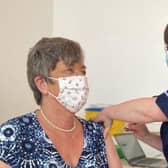 Elizabeth Anne Kirk, being given the vaccine at the Royal Highland Centre, Ingliston, on Wednesday.