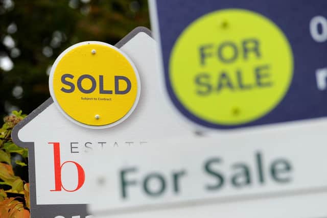 Estate agents boards, as house prices continue to rocket. Picture: Andrew Matthews/PA Wire