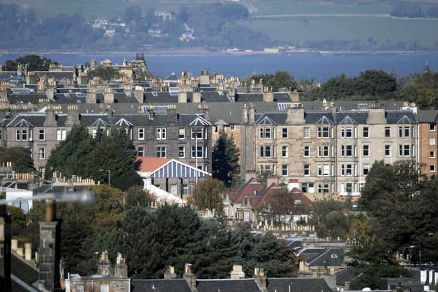 Edinburgh rooftops looking over the Forth in to Fife on a clear day. Council taxes are rising by as much as 10 per cent in local authorities across Scotland