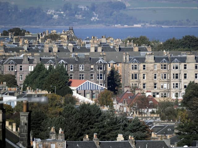 Edinburgh rooftops looking over the Forth in to Fife on a clear day. Council taxes are rising by as much as 10 per cent in local authorities across Scotland
