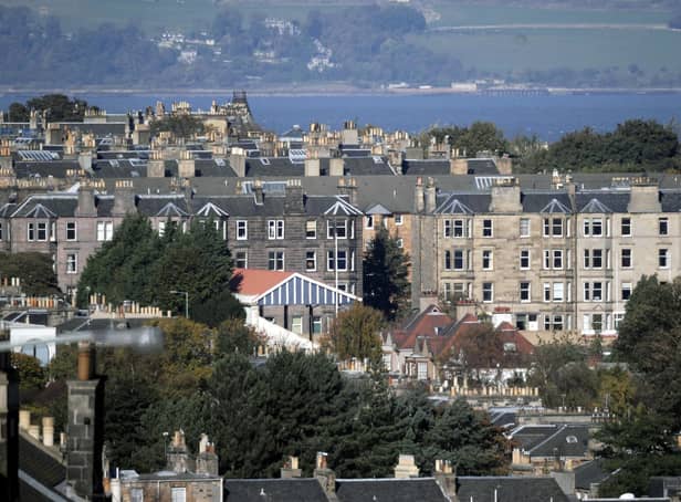 Edinburgh rooftops looking over the Forth in to Fife on a clear day. Council taxes are rising by as much as 10 per cent in local authorities across Scotland