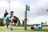 Connacht's Diarmuid Kilgallen dives to score the opening try despite Huw Jones of Glasgow Warriors. Pic: Ben Brady/INPHO/Shutterstock