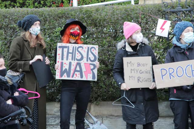 Outside the Polish Consulate in Edinburgh in October 2020, Scottish and Polish protestors wore clothes and carried iconography reminiscent of the 2016 Black Monday protests, when the Polish government attempted to ban abortion outright in the country.