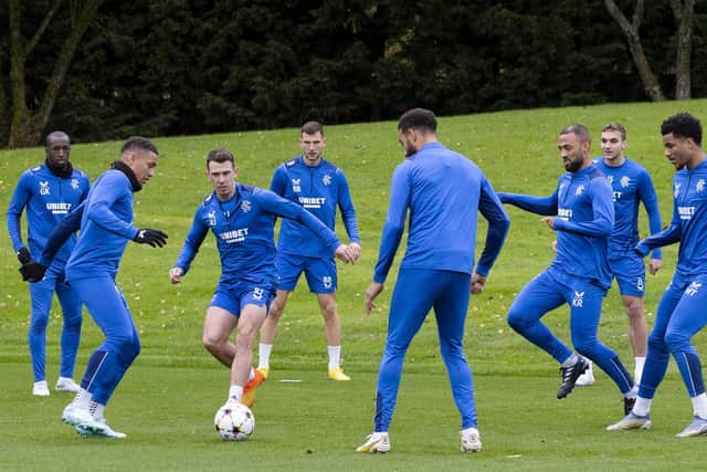 Rangers' players prepare for the match at Liverpool.