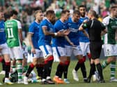Rangers players argue with Referee Willie Collum after he produces a red card for John Lundstram for a foul on Martin Boyle. Picture: Alan Harvey / SNS