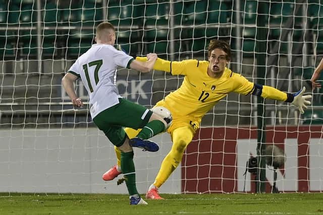 Ross Tierney of Republic of Ireland sees his shot saved by Marco Carnesecchi of Italy during the UEFA European U21 Championship Qualifier between Republic of Ireland and Italy at Tallaght Stadium on November 12, 2021 in Tallaght, Ireland. (Photo by Charles McQuillan/Getty Images)