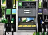 There are calls for further cuts to fuel duty following the soaring price rises in petrol (Photo by Ben Stansall / AFP).