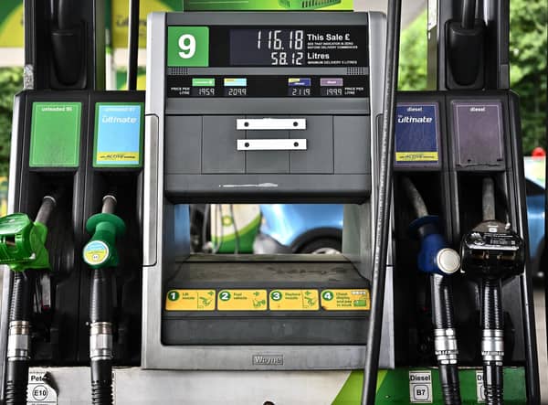 There are calls for further cuts to fuel duty following the soaring price rises in petrol (Photo by Ben Stansall / AFP).