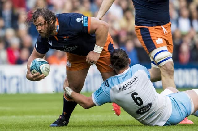 Pierre Schoeman (left) in typically combative action for Edinburgh during the win over Glasgow Warriors at BT Murrayfield. (Photo by Ross Parker / SNS Group)