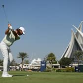 Tommy Fleetwood plays his second shot on the 18th hole during the third round of the Dubai Invitational at Dubai Creek Golf and Yacht Club. Picture: Alex Burstow/Getty Images.