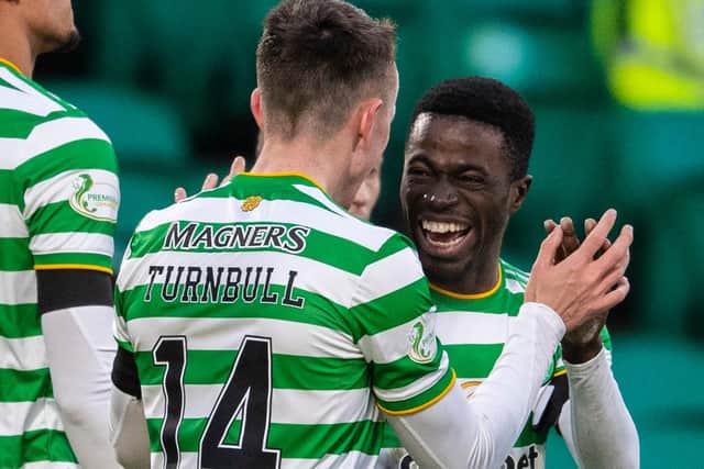 Ismaila Soro celebrates with David Turnbull after the latter made it 2-0 in the impressive 3-0 win over Dundee United. (Photo by Craig Foy / SNS Group)