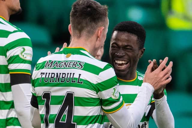 Ismaila Soro celebrates with David Turnbull after the latter made it 2-0 in the impressive 3-0 win over Dundee United. (Photo by Craig Foy / SNS Group)