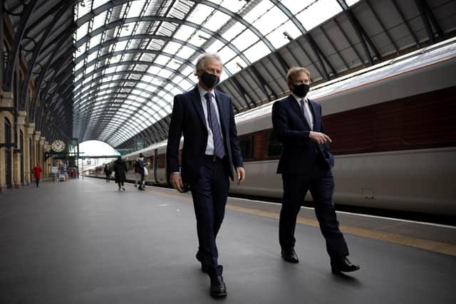 The shake-up was devised by Royal Mail chairman Keith Williams, left, and UK Transport Secretary Grant Shapps, right