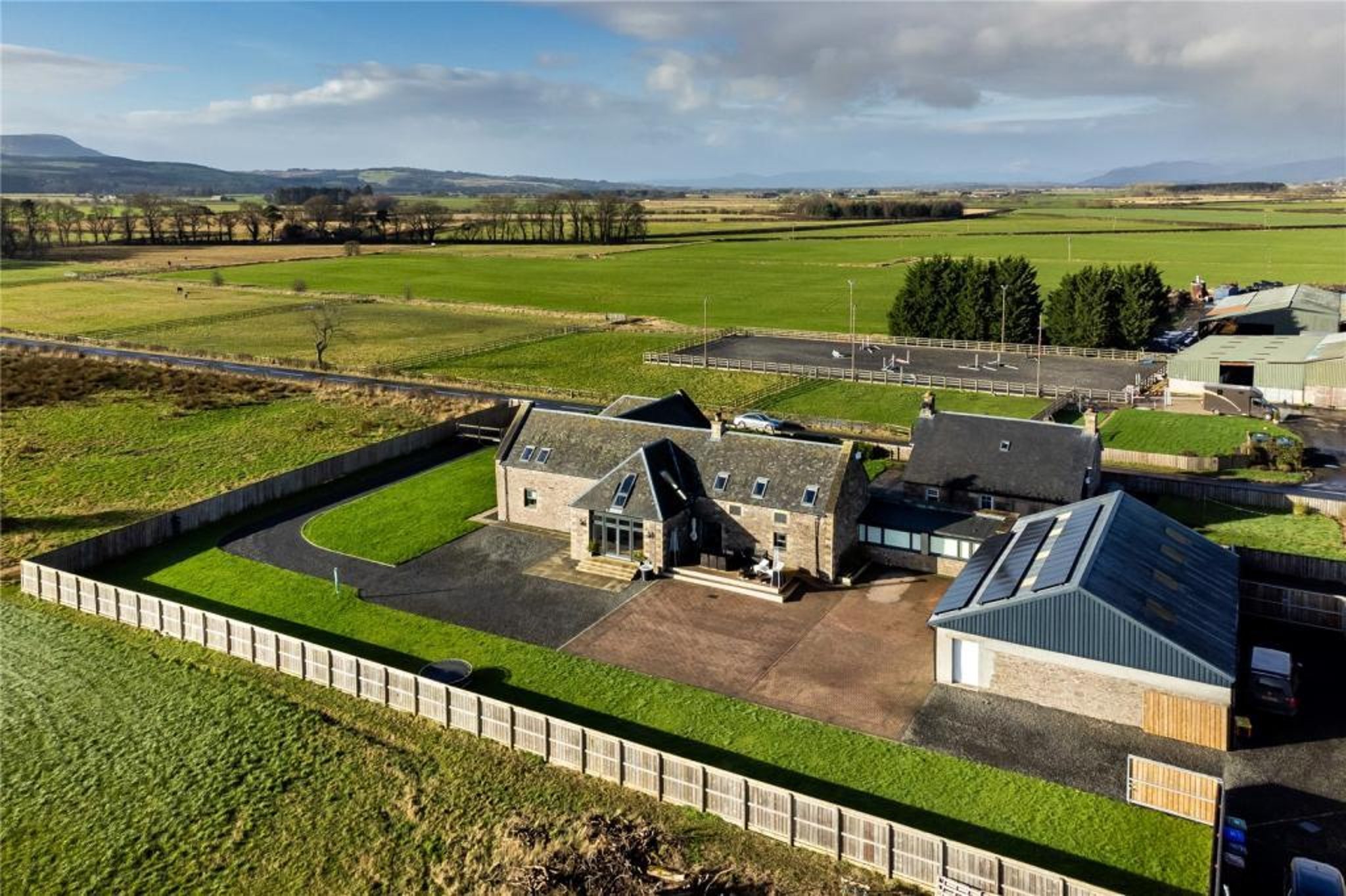 This former farm steading has been converted into a stunning modern 5-bedroom home with spectacular views of the Stirlingshire countryside