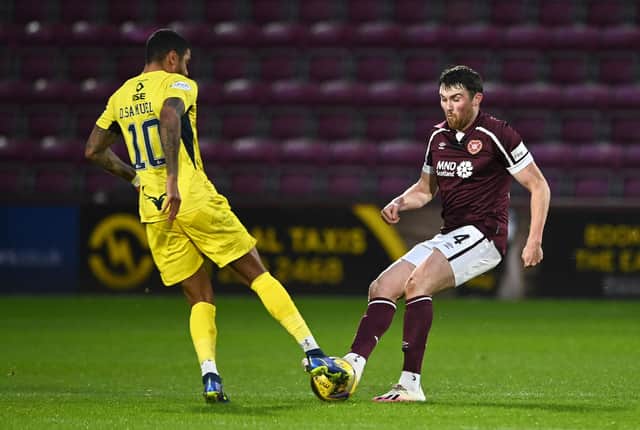 Hearts defender John Souttar challenges Dominic Samuel during the 2-1 win over Ross County at Tynecastle on Boxing Day. (Photo by Paul Devlin / SNS Group)