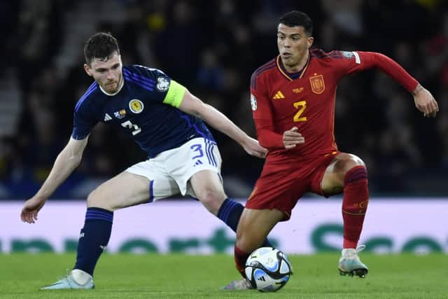 Scotland captain Andy Robertson had a ding-dong battle with Spain's Pedro Porro.