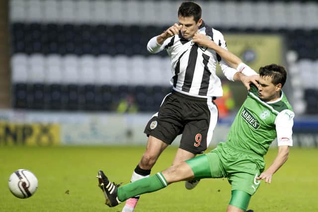 In typically battling form for Hibs against St Mirren's Steven Thompson