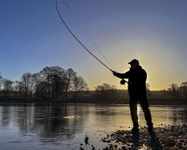 A fisherman casts a line on the River Tay. Scottish Water has been accused of covering up the release of wet wipes, sanitary pads and other sewage litter into the river in Perthshire. Picture: Lisa Ferguson