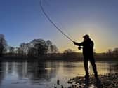 A fisherman casts a line on the River Tay. Scottish Water has been accused of covering up the release of wet wipes, sanitary pads and other sewage litter into the river in Perthshire. Picture: Lisa Ferguson