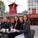 Michaela, Julia, Lucy and Ashlie in front of the Moulin Rouge Pic: ©Philippe Wojazer - Moulin Rouge