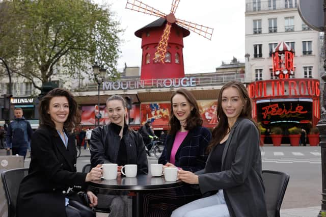 Michaela, Julia, Lucy and Ashlie in front of the Moulin Rouge Pic: ©Philippe Wojazer - Moulin Rouge