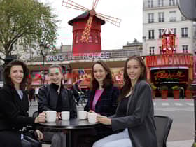 Michaela, Julia, Lucy and Ashlie in front of the Moulin Rouge Pic: ©Philippe Wojazer - Moulin Rouge