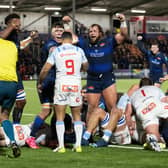 Edinburgh's Pierre Schoeman (centre) celebrates as Ewan Ashman touches down for a try during the win over Vodacom Bulls. (Photo by Paul Devlin / SNS Group)