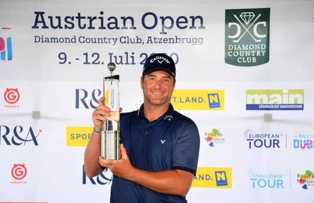Marc Warren poses with the trophy after winning the Austrian Open at Diamond Country Club, near Vienna. Picture: Stuart Franklin/Getty Images