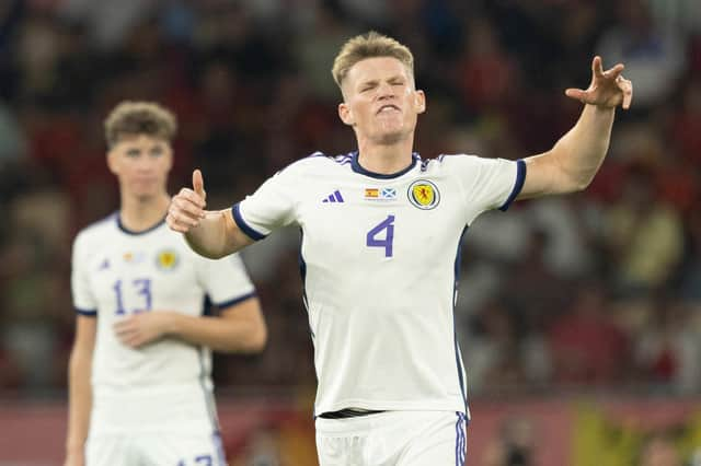 Scotland's Scott McTominay looks dejected as his goal against Spain is ruled out by VAR. (Photo by Craig Foy / SNS Group)