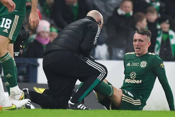 Celtic's David Turnbull shows his distress after sustaining the hamstring strain in the League Cup final little over a week ago that is likely to sideline him until March. (Photo by Craig Foy / SNS Group)